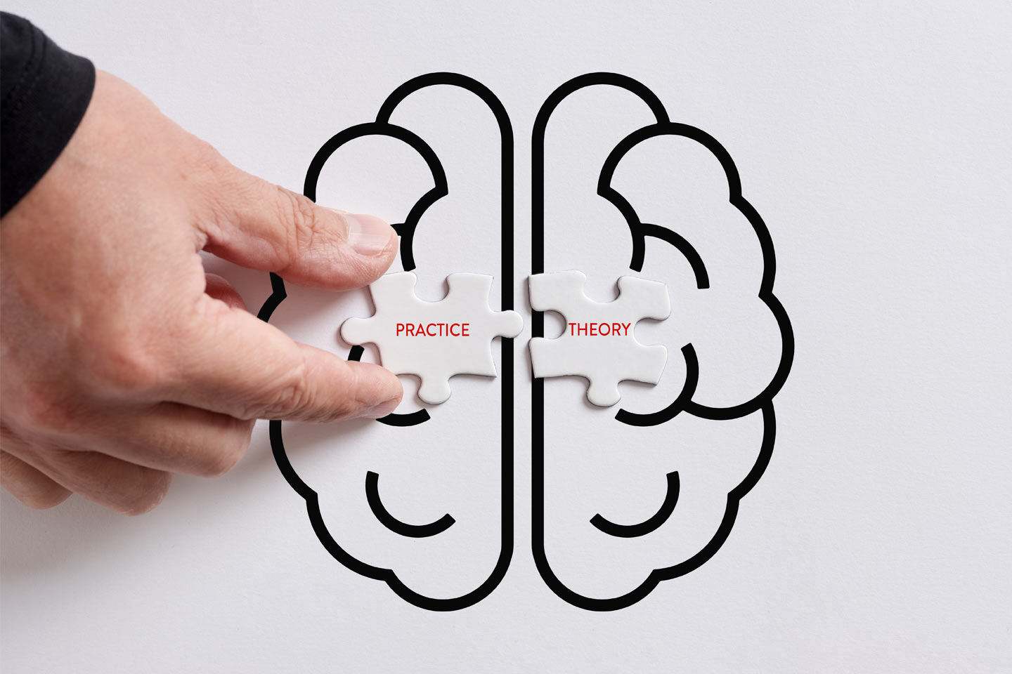 a hand holds a piece of puzzle on the left side that says 